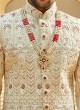 Wedding Wear Lucknowi Work Shrewani In Golden Cream Color